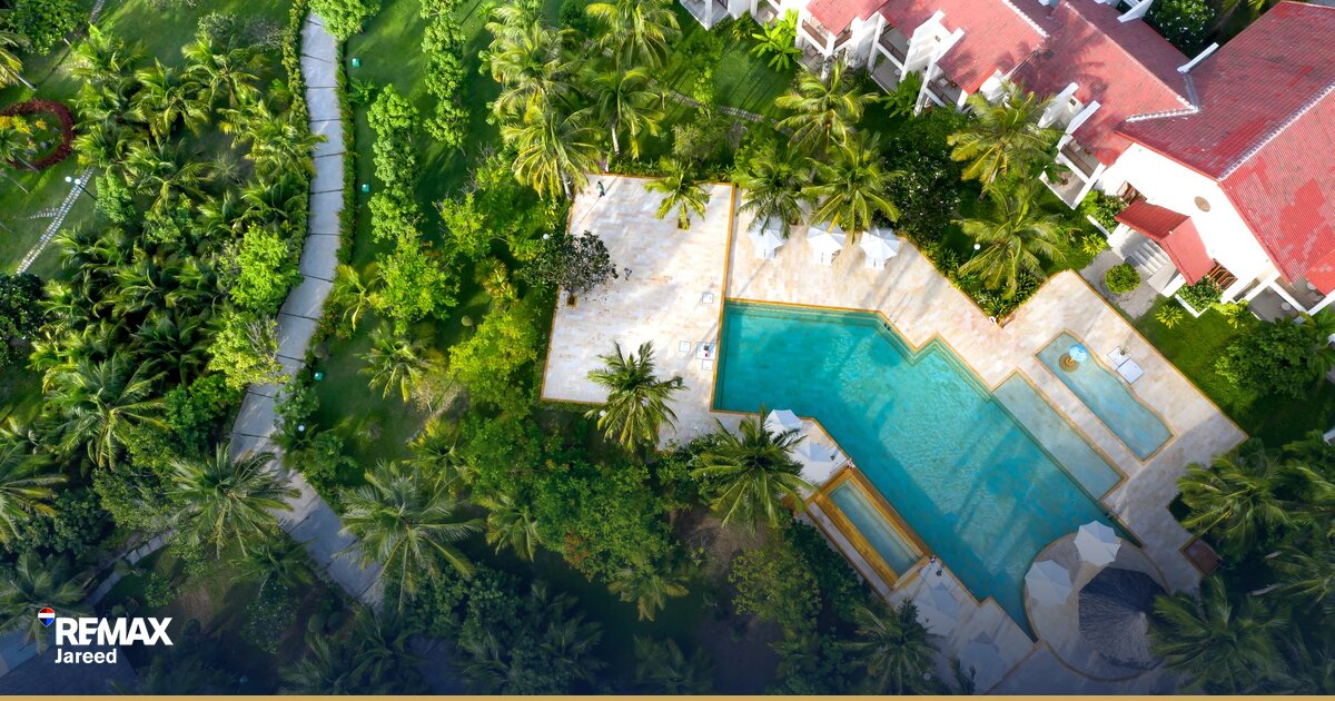 Aerial view of gated residential compound with villas and greenery in West Cairo Egypt
