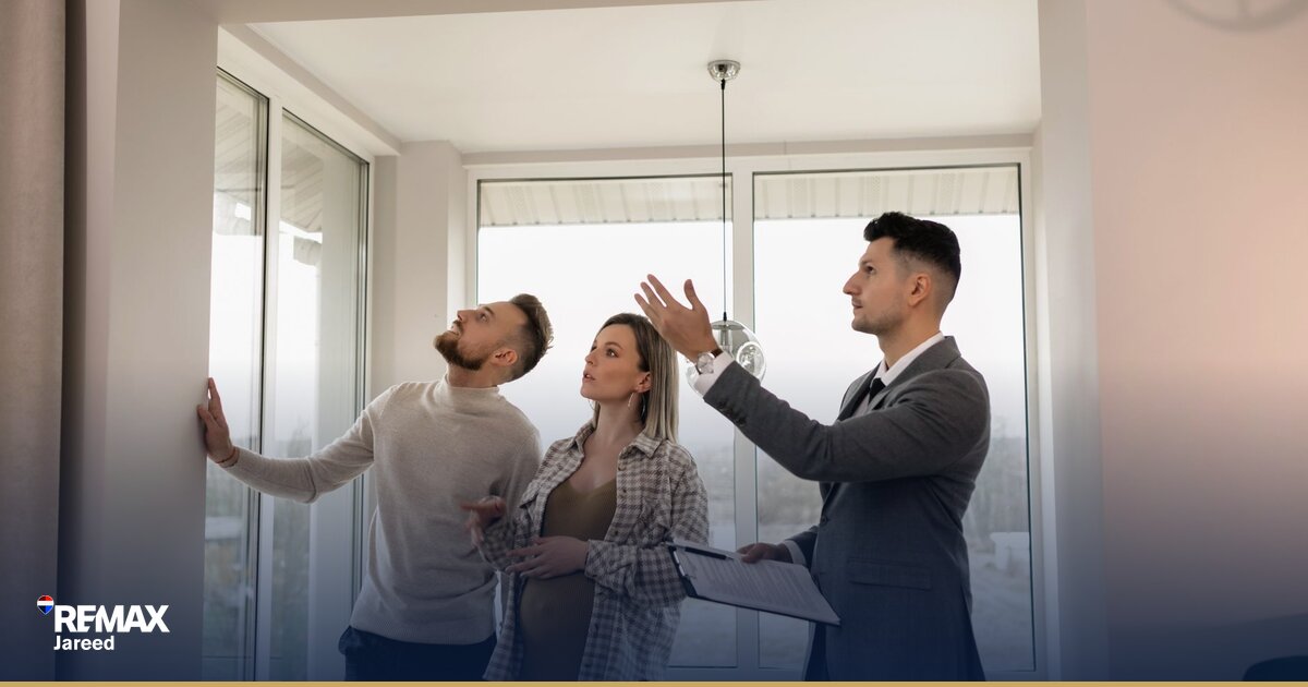 Property consultant reviewing commission statement after successful real estate transaction