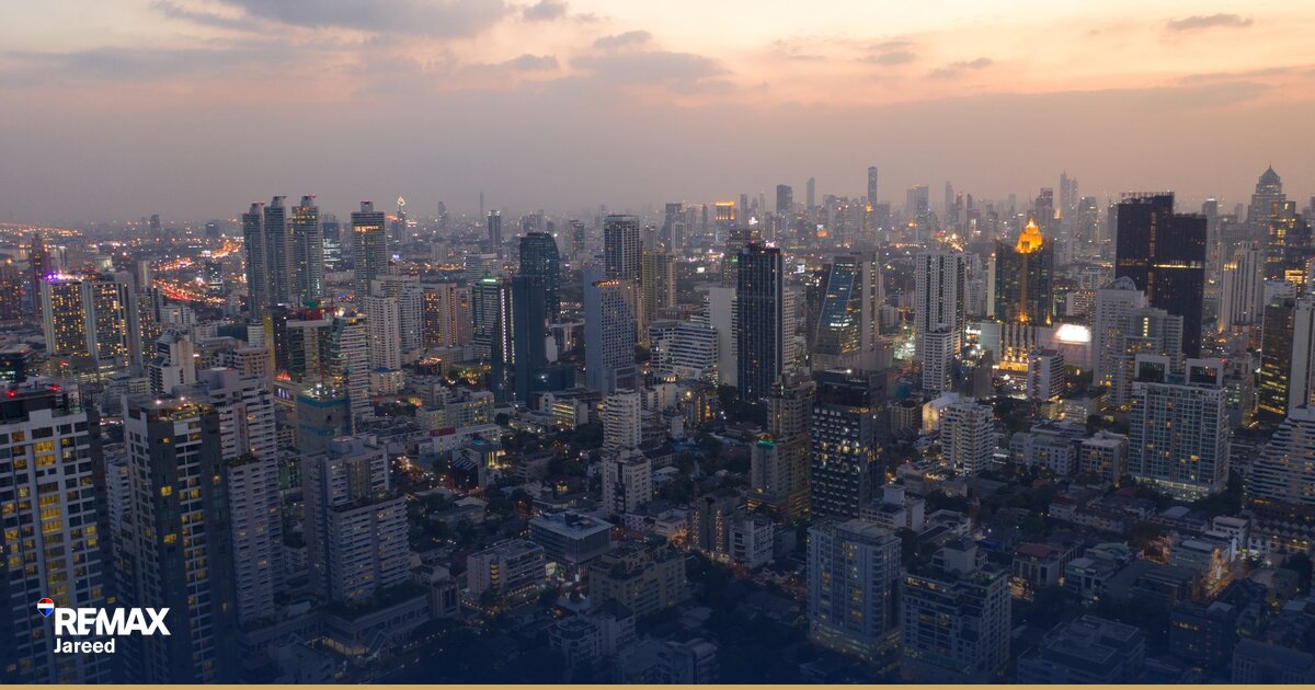 High-rise residential towers under construction in Sheikh Zayed with cranes against clear sky, representing off-plan real estate development in West Cairo