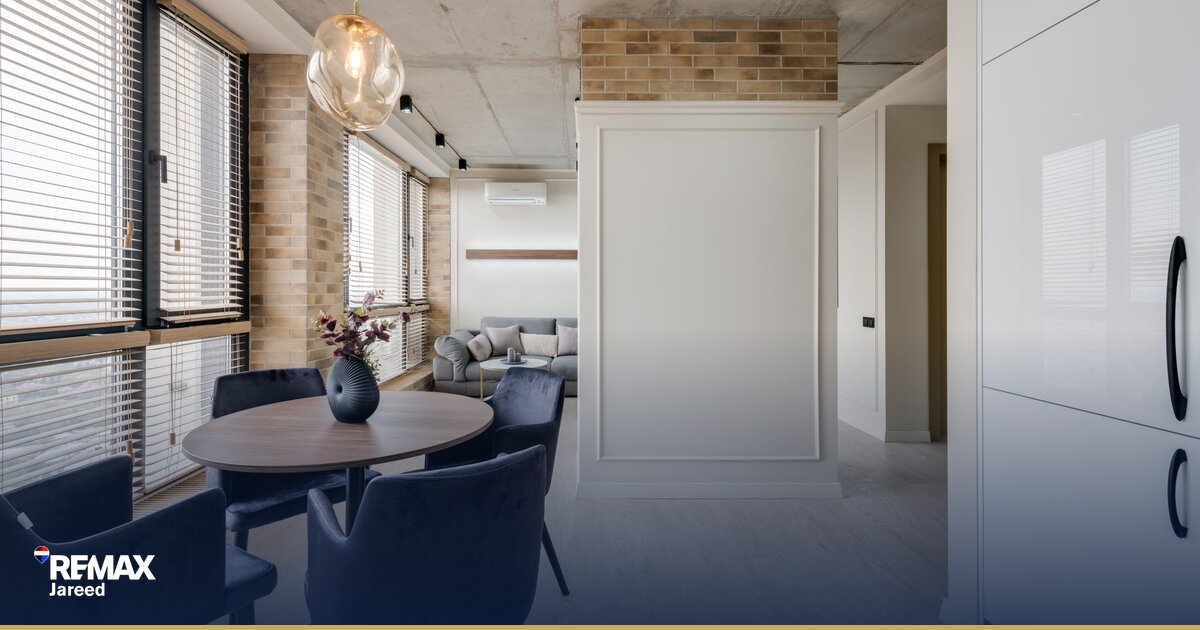 Modern luxury apartment interior in Sheikh Zayed showing open-plan living space with premium finishing and natural light
