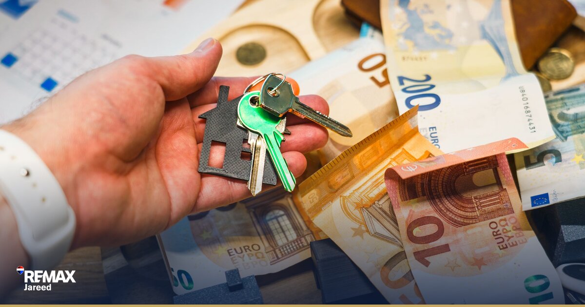 Property buyer reviewing closing cost documents and signing transfer paperwork at handover in Egypt