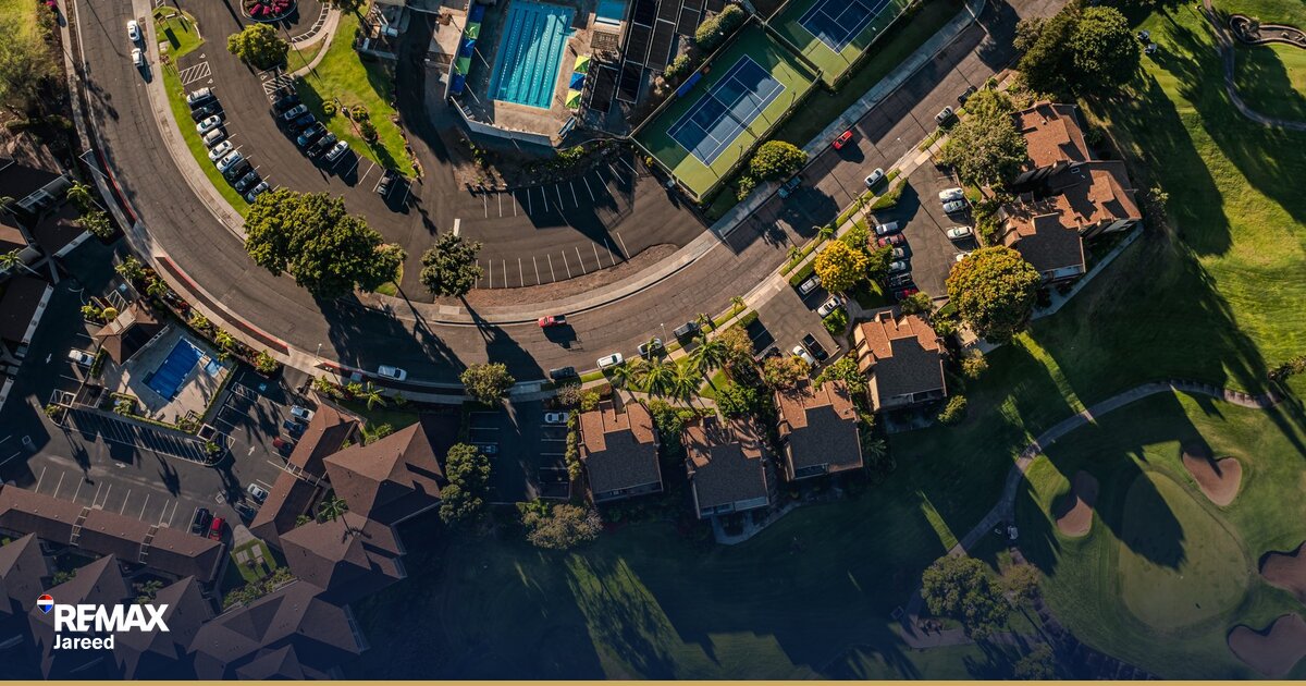 Aerial view of green residential compound with landscaped parks in Cairo Egypt suburbs